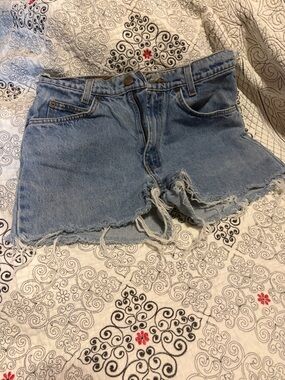 Levi's Light Blue Distressed Denim Shorts with Frayed Hem